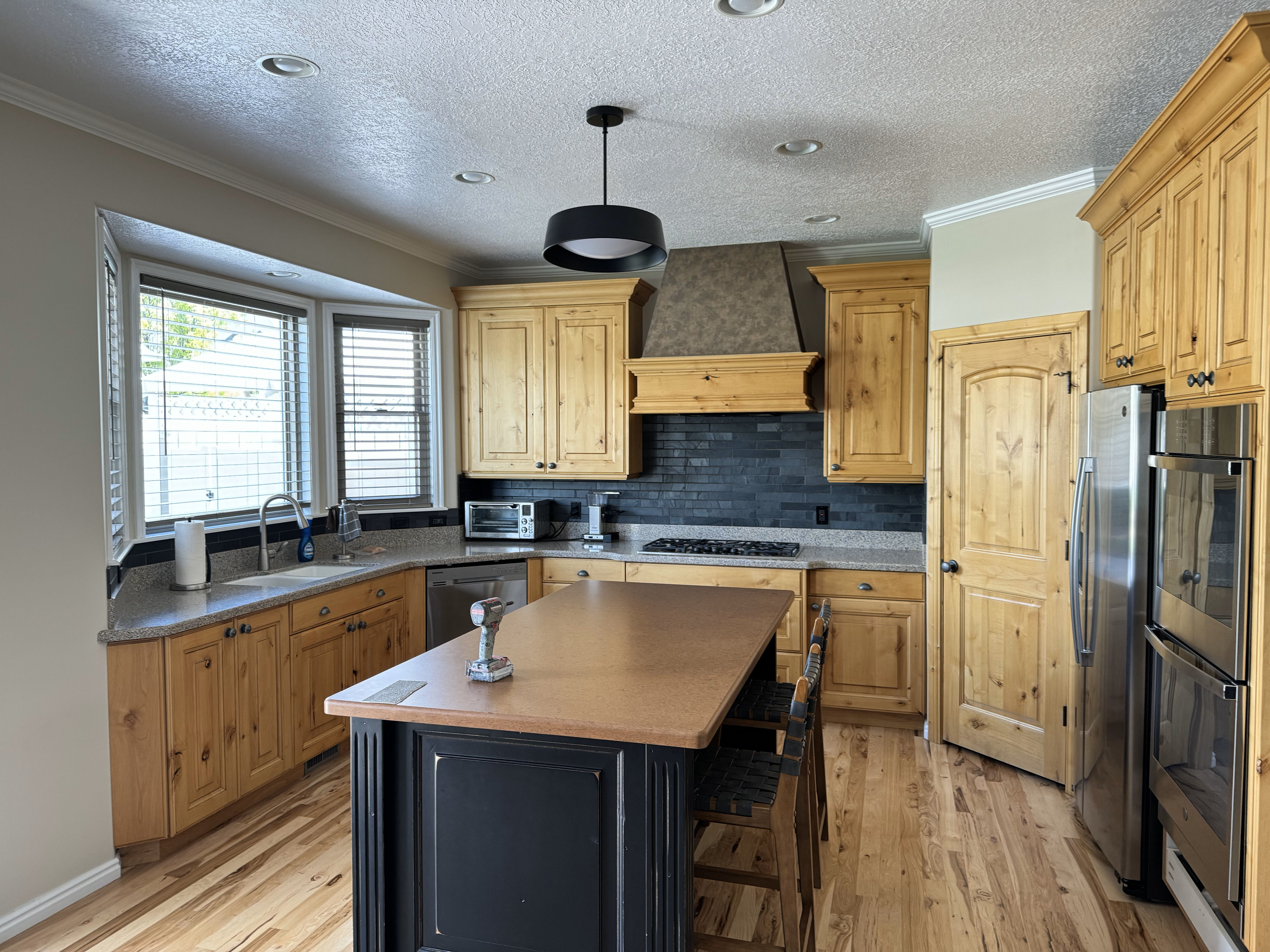 Stained cabinets that removed natural yellow Before