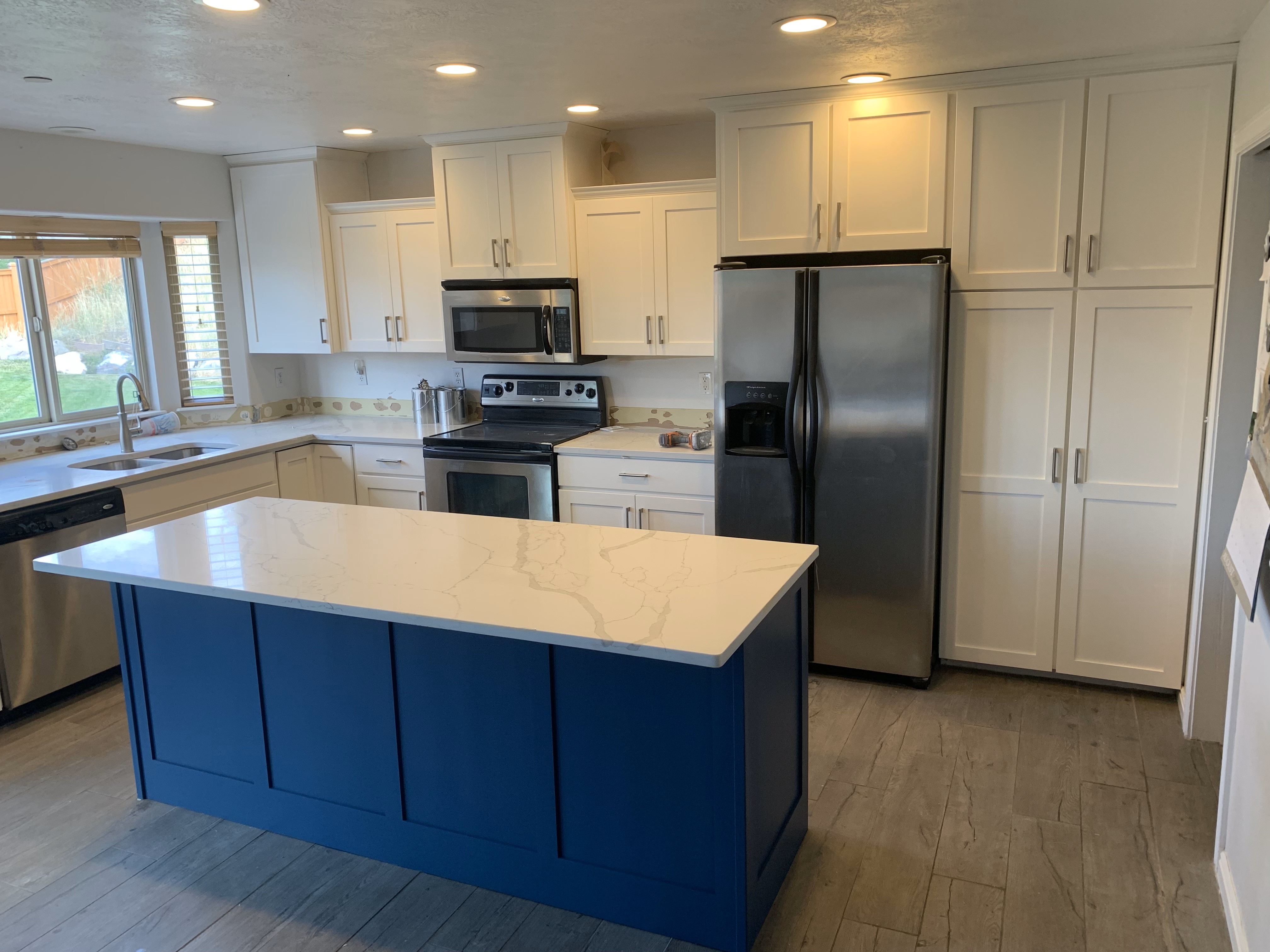 Refaced kitchen cabinets with new doors After