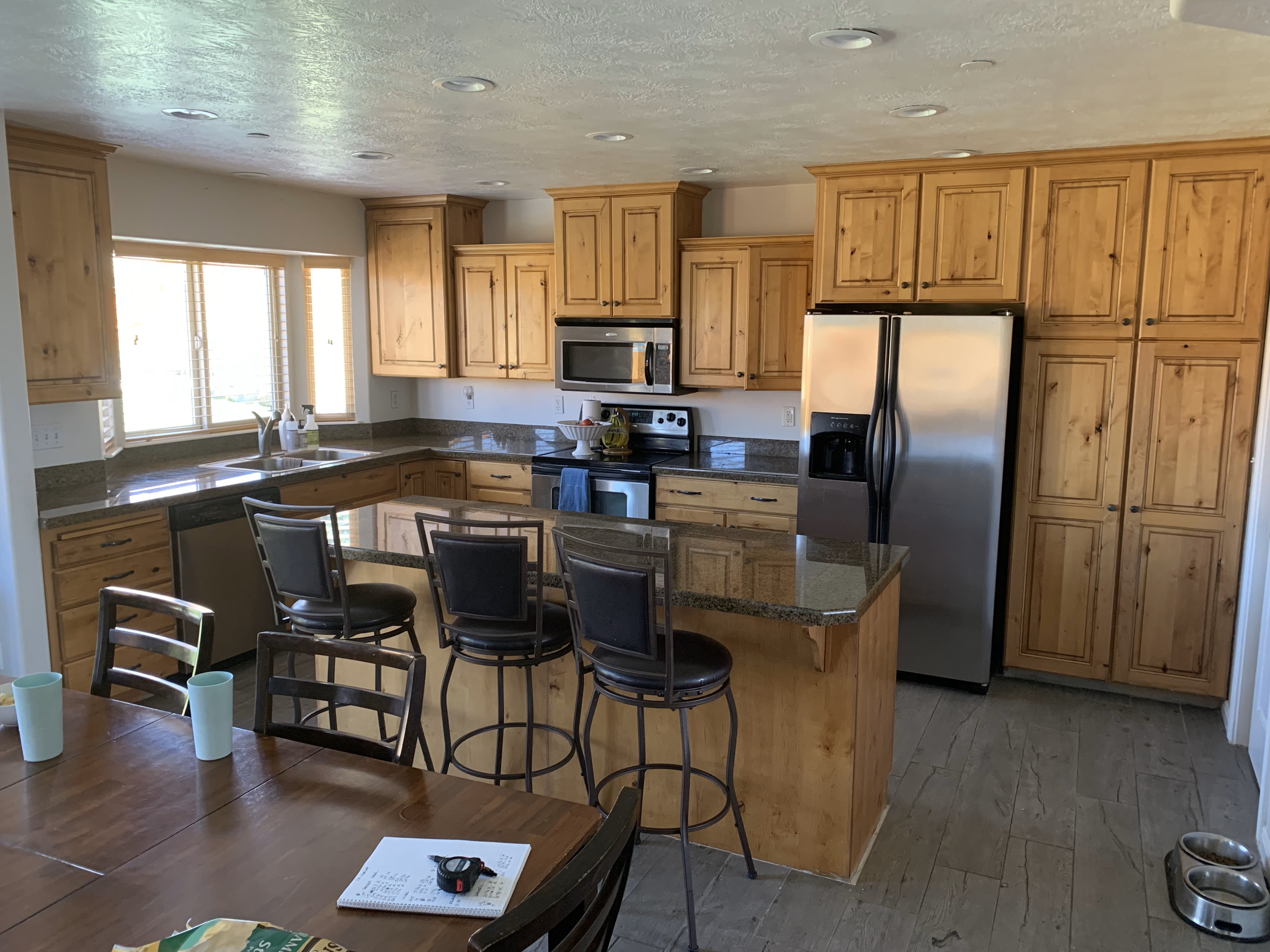 Refaced kitchen cabinets with new doors Before