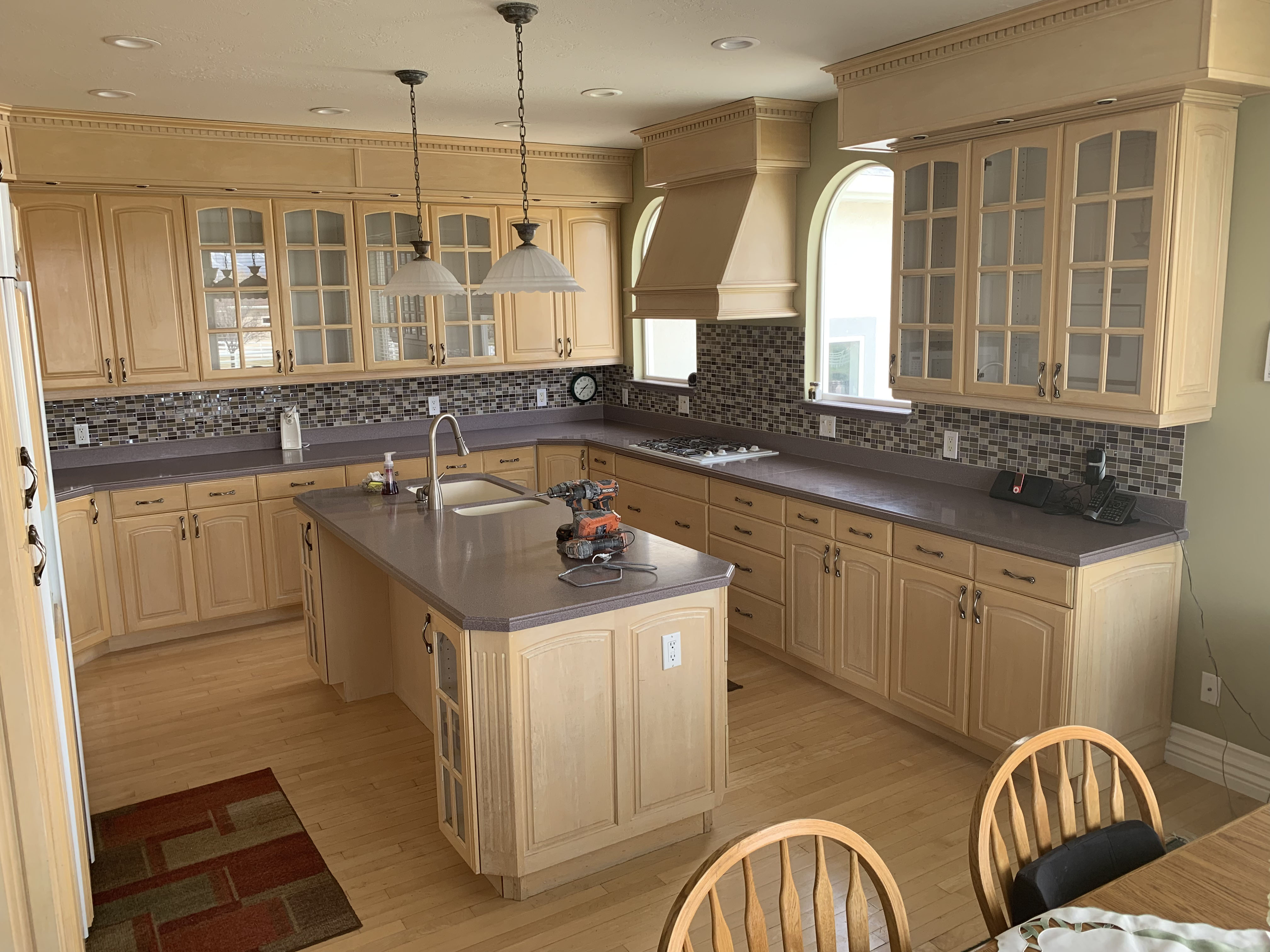 Refinished cabinets with a modern look Before